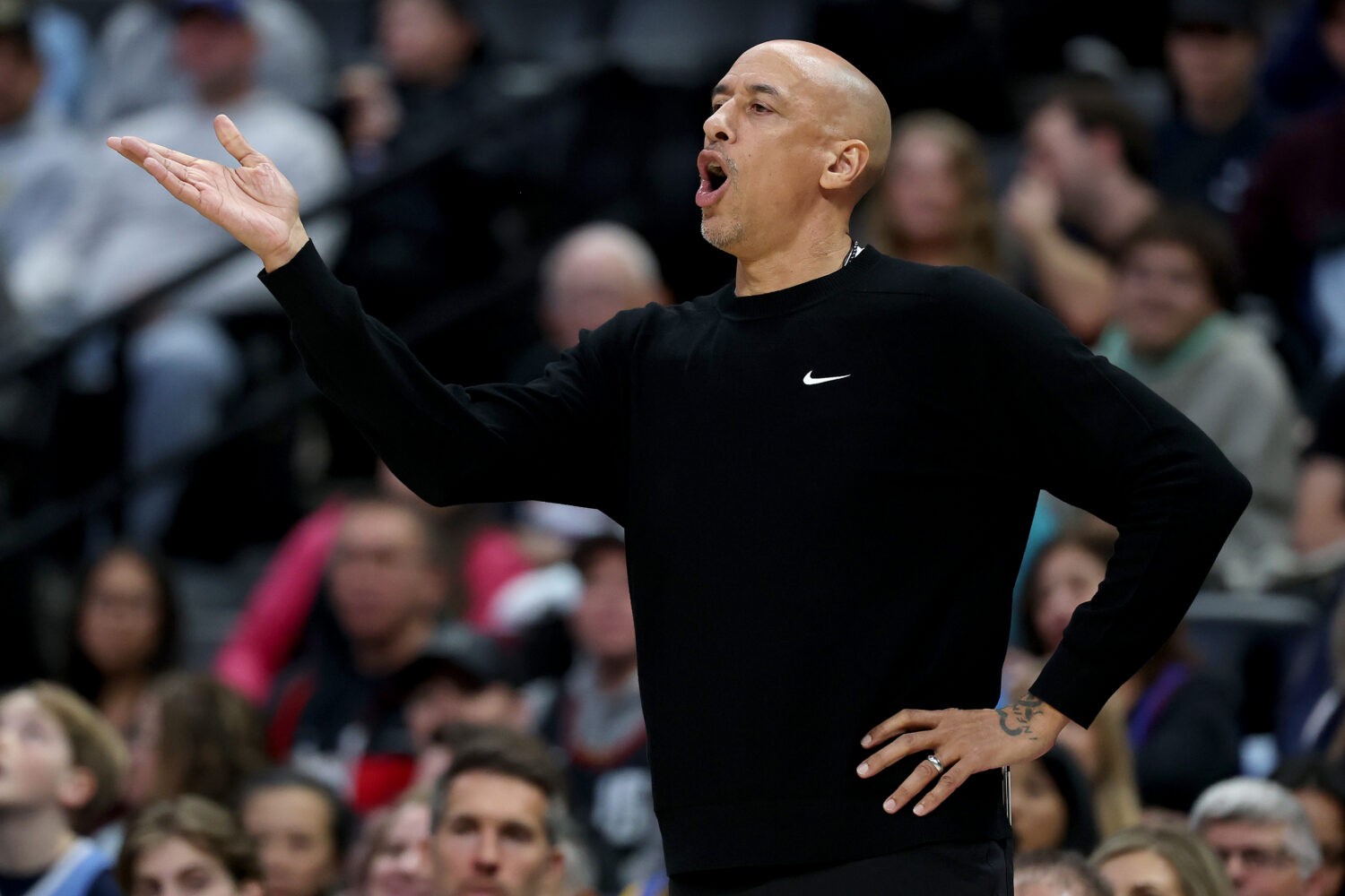 DENVER, COLORADO - NOVEMBER 22: Head coach Doug Christie of the Sacramento Kings goes directs his t...