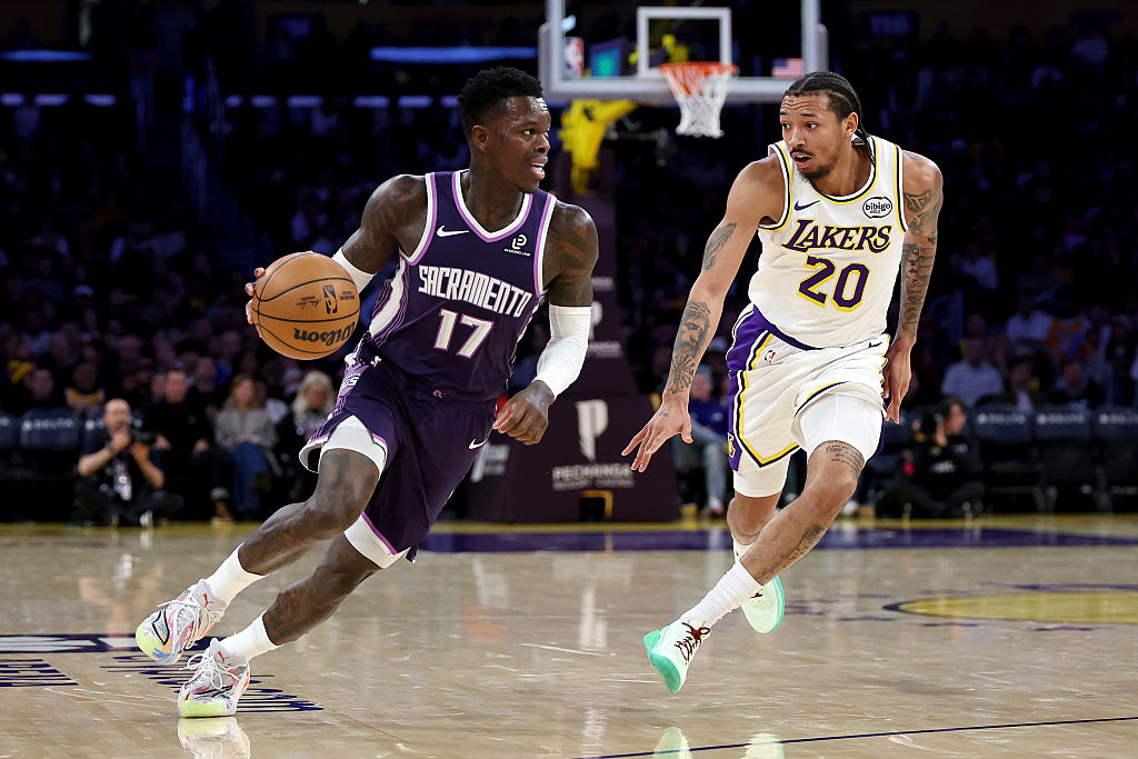 LOS ANGELES, CALIFORNIA - DECEMBER 28: Dennis Schroder #17 of the Sacramento Kings dribbles the bal...