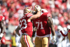 SANTA CLARA, CALIFORNIA - OCTOBER 01: Christian McCaffrey #23 of the San Francisco 49ers celebrates with Trent Williams #71 of the San Francisco 49ers after running for a touchdown during an NFL football game between the San Francisco 49ers and the Arizona Cardinals at Levi's Stadium on October 01, 2023 in Santa Clara, California. (Photo by Michael Owens/Getty Images)