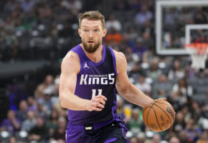 SACRAMENTO, CALIFORNIA - MARCH 24: Domantas Sabonis #11 of the Sacramento Kings dribbles the ball up court against the Boston Celtics during the first half of an NBA basketball game at Golden 1 Center on March 24, 2025 in Sacramento, California. NOTE TO USER: User expressly acknowledges and agrees that, by downloading and or using this photograph, User is consenting to the terms and conditions of the Getty Images License Agreement. (Photo by Thearon W. Henderson/Getty Images)