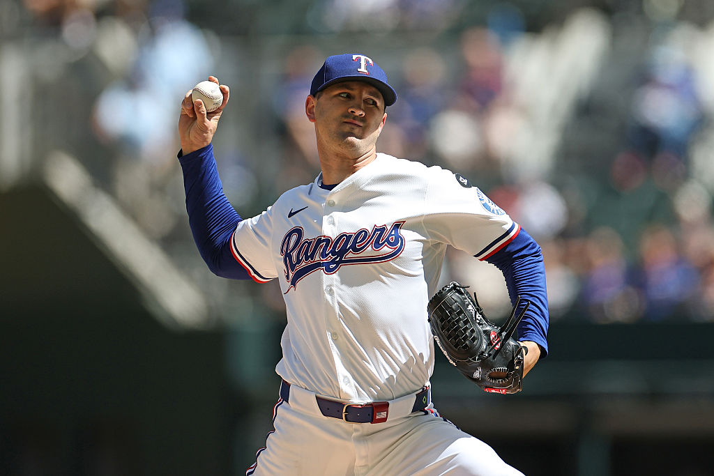 ARLINGTON, TEXAS - SEPTEMBER 25: Tyler Mahle #51 of the Texas Rangers throws a pitch during the fir...
