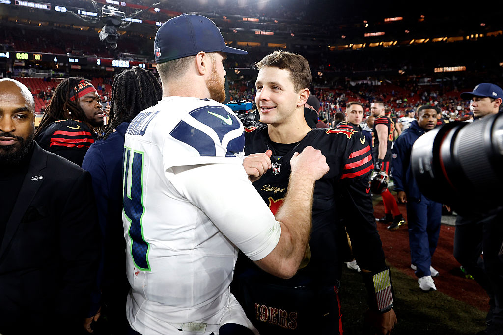 SANTA CLARA, CALIFORNIA - JANUARY 03: Brock Purdy #13 of the San Francisco 49ers shakes hand with S...