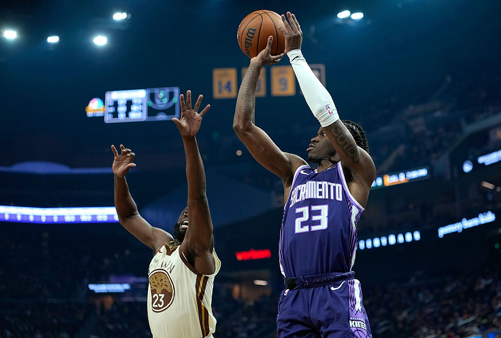 SAN FRANCISCO, CALIFORNIA - JANUARY 09: Keon Ellis #23 of the Sacramento Kings shoots a three-point...