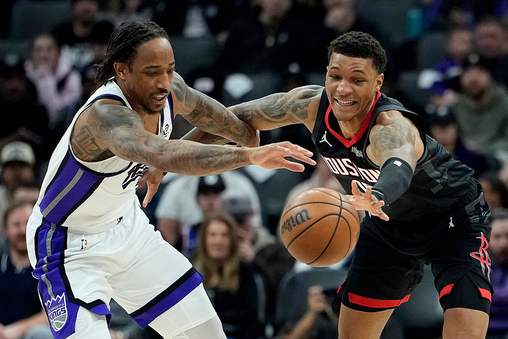 SACRAMENTO, CALIFORNIA - JANUARY 11: DeMar DeRozan #10 of the Sacramento Kings and Jabari Smith Jr....