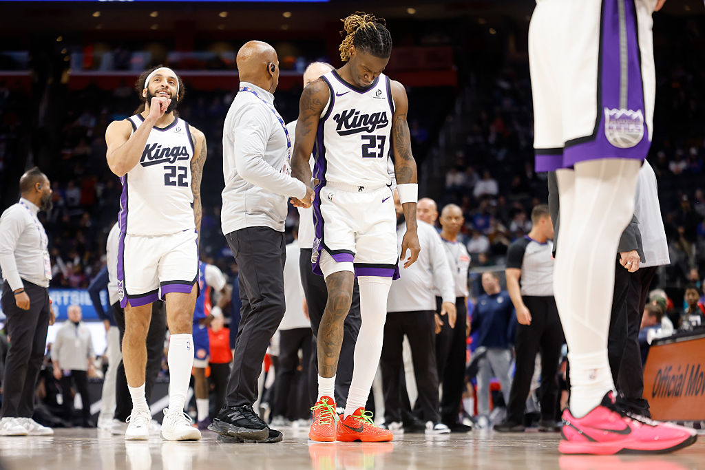 DETROIT, MICHIGAN - JANUARY 25: Keon Ellis #23 of the Sacramento Kings walks to the bench during th...