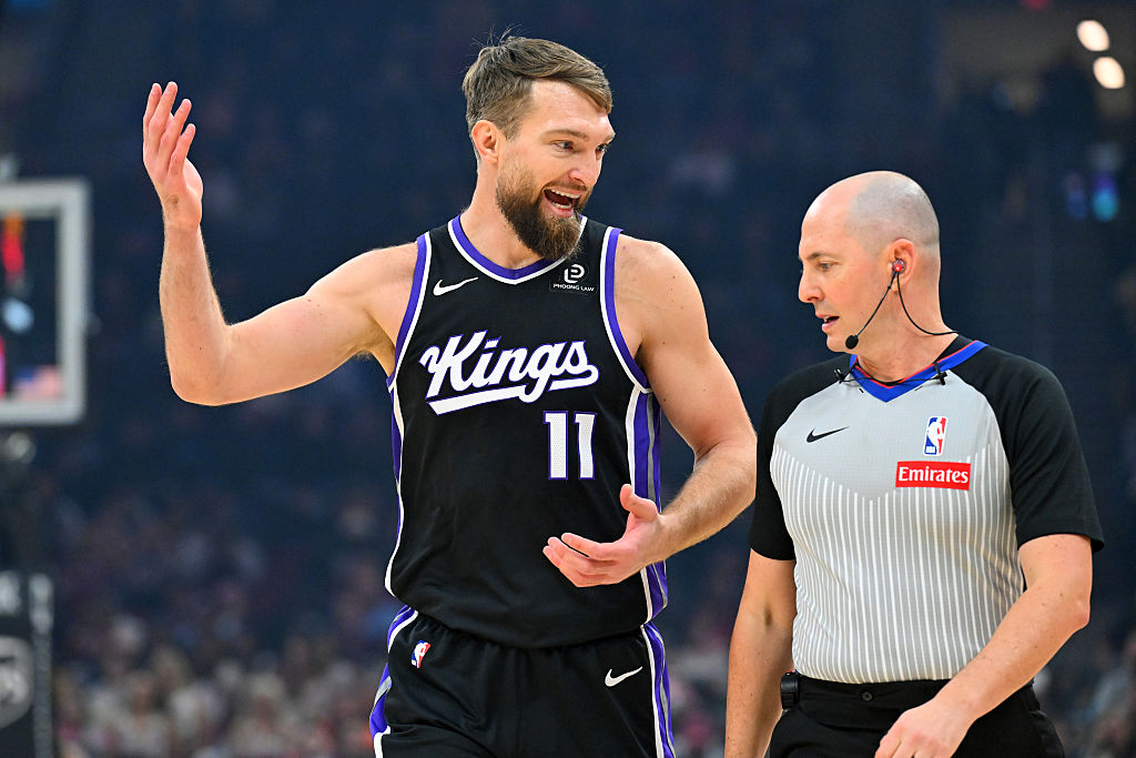 CLEVELAND, OHIO - JANUARY 23: Forward Domantas Sabonis #11 of the Sacramento Kings talks with refer...