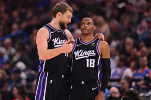 OKLAHOMA CITY, OKLAHOMA - OCTOBER 28: Domantas Sabonis #11 and Russell Westbrook #18 of the Sacramento Kings discuss a play during the first half against the Oklahoma City Thunder at Paycom Center on October 28, 2025 in Oklahoma City, Oklahoma. NOTE TO USER: User expressly acknowledges and agrees that, by downloading and or using this photograph, User is consenting to the terms and conditions of the Getty Images License Agreement. (Photo by Joshua Gateley/Getty Images) NBA expansion draft