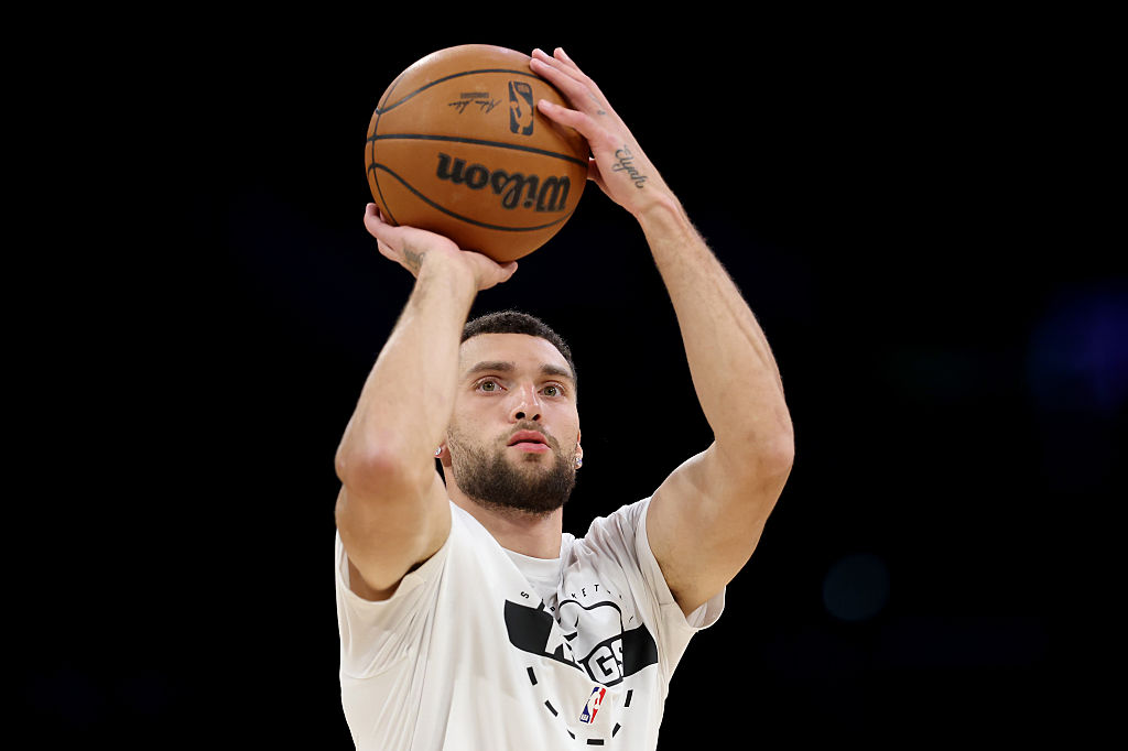 LOS ANGELES, CALIFORNIA - DECEMBER 28: Zach Lavine #8 of the Sacramento Kings warms up before the g...