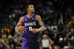 SACRAMENTO, CALIFORNIA - JANUARY 12: Malik Monk #0 of the Sacramento Kings reacts after he made a three-point basket over LeBron James #23 of the Los Angeles Lakers in the fourth quarter at Golden 1 Center on January 12, 2026 in Sacramento, California. NOTE TO USER: User expressly acknowledges and agrees that, by downloading and/or using this photograph, user is consenting to the terms and conditions of the Getty Images License Agreement. (Photo by Ezra Shaw/Getty Images)