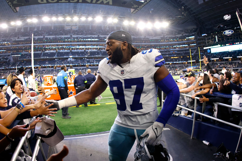 ARLINGTON, TEXAS - NOVEMBER 30: Defensive tackle Osa Odighizuwa #97 of the Dallas Cowboys walks off...