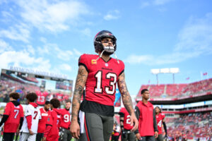 TAMPA, FLORIDA - DECEMBER 29: Mike Evans #13 of the Tampa Bay Buccaneers looks on before the game against the Carolina Panthers at Raymond James Stadium on December 29, 2024 in Tampa, Florida. (Photo by Julio Aguilar/Getty Images)