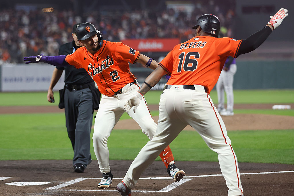 SAN FRANCISCO, CALIFORNIA - SEPTEMBER 26: Willy Adames #2 of the San Francisco Giants celebrates wi...