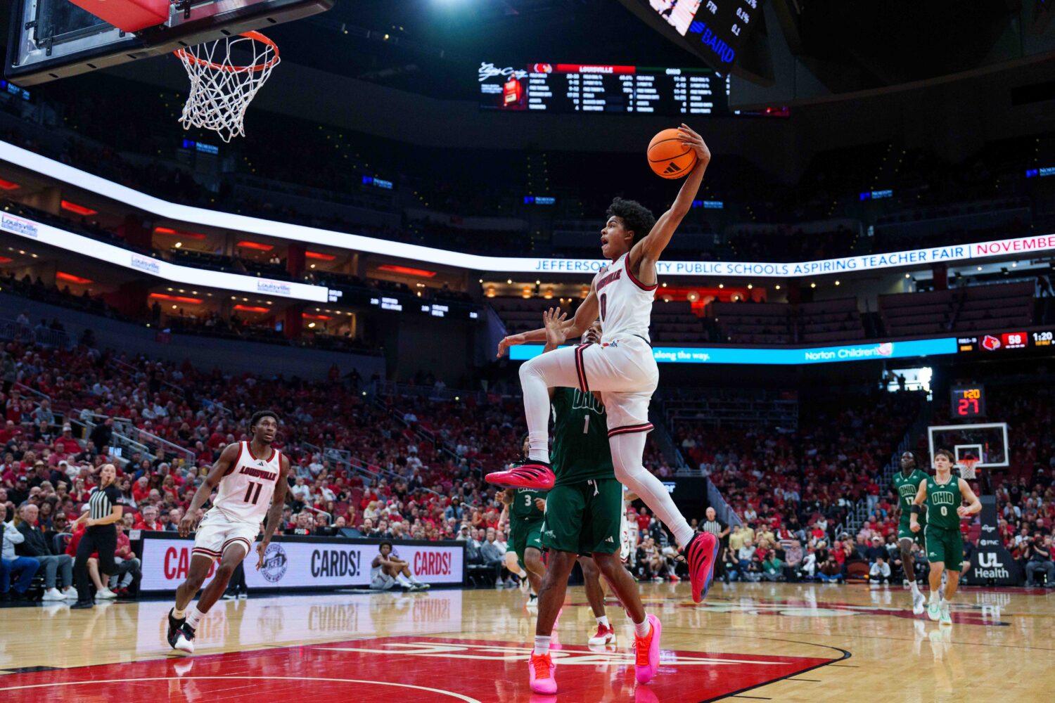 LOUISVILLE, KENTUCKY - NOVEMBER 15: Mikel Brown Jr. #0 of the Louisville Cardinals attempts a dunk ...