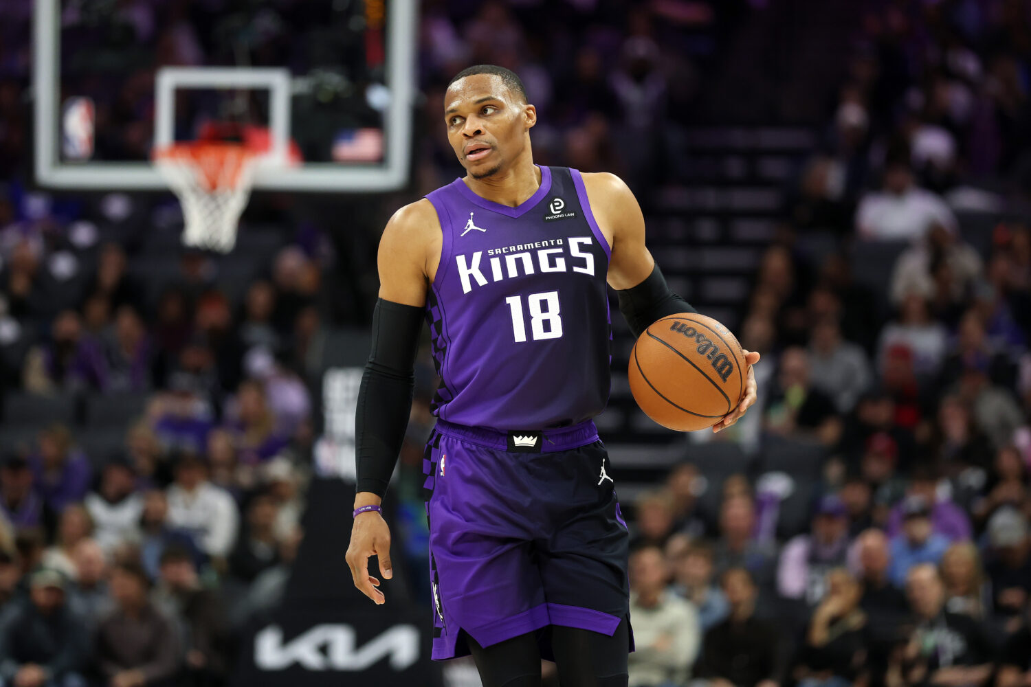 SACRAMENTO, CALIFORNIA - JANUARY 06: Russell Westbrook #18 of the Sacramento Kings dribbles the bal...