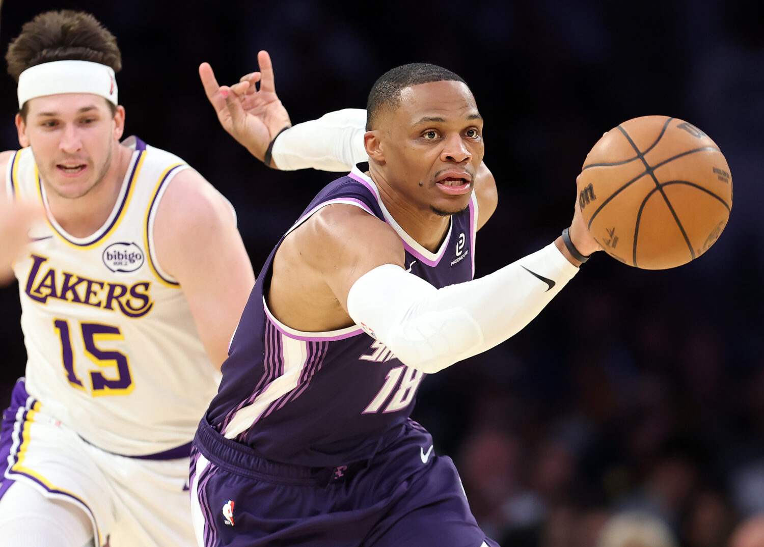 LOS ANGELES, CALIFORNIA - MARCH 01: Russell Westbrook #18 of the Sacramento Kings controls the ball...
