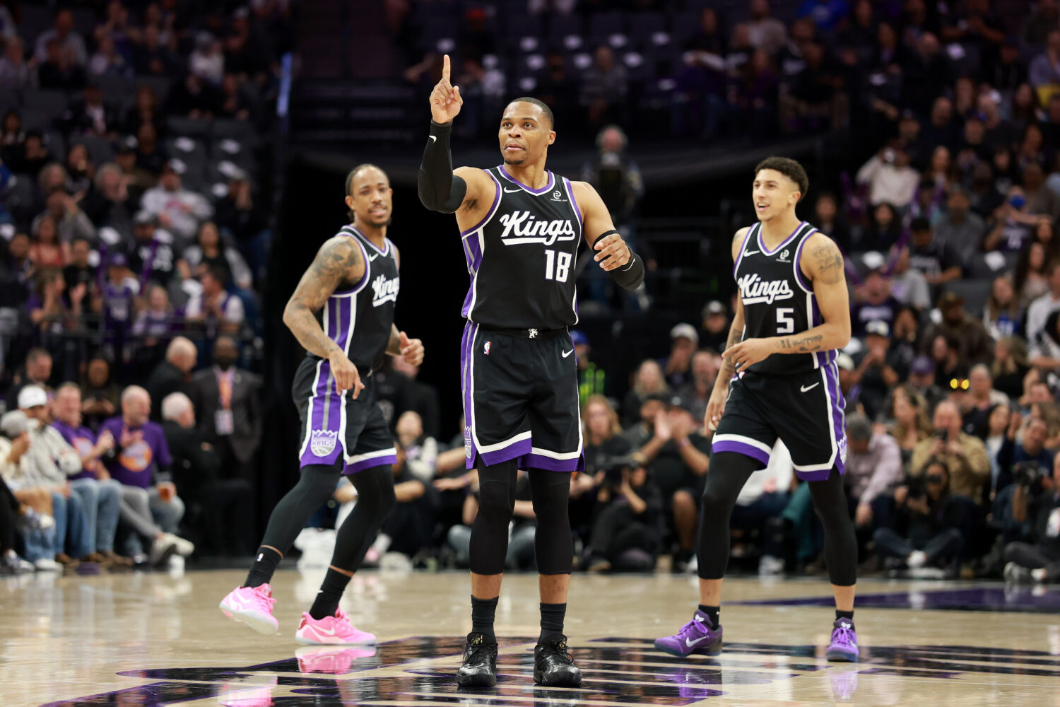 SACRAMENTO, CALIFORNIA - MARCH 05: Russell Westbrook #18 of the Sacramento Kings reacts during thei...