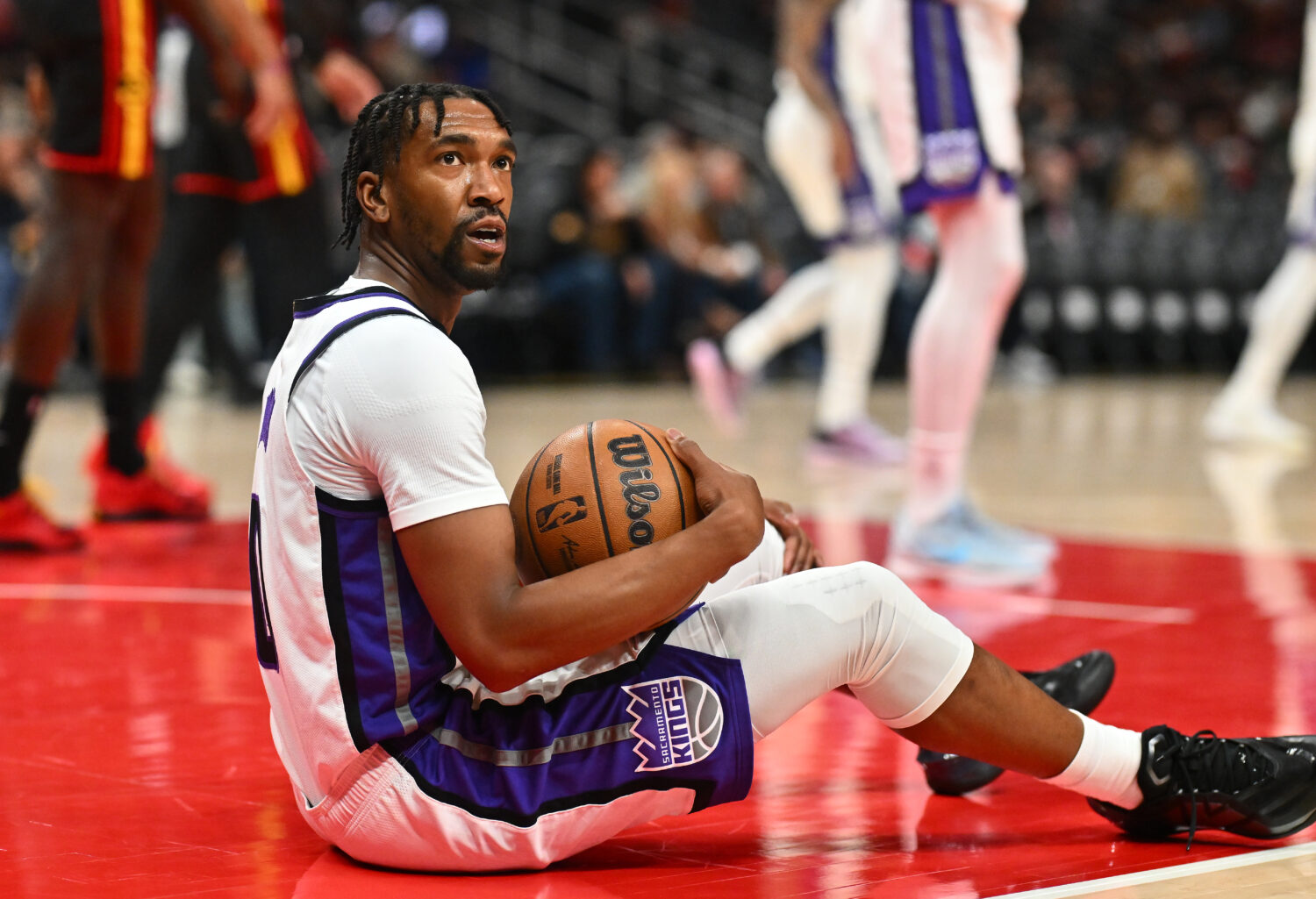 ATLANTA, GEORGIA - MARCH 28: Malik Monk #0 of the Sacramento Kings reacts against the Atlanta Hawks...
