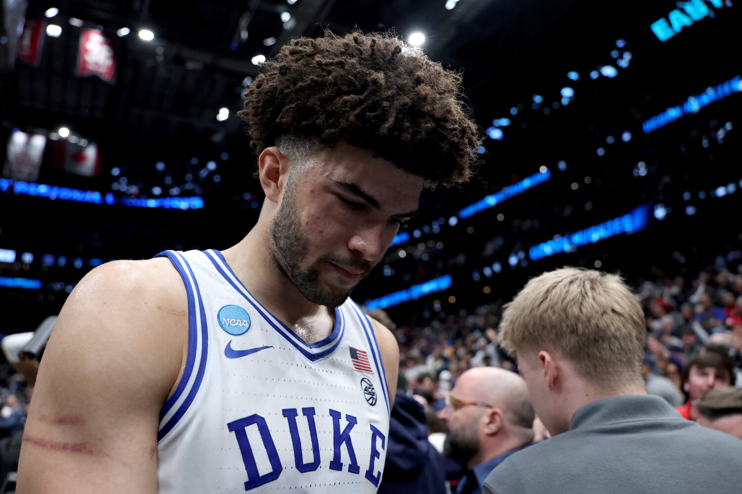 WASHINGTON, DC - MARCH 29: Cameron Boozer #12 of the Duke Blue Devils walks off the court after bei...