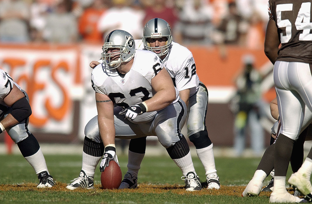 CLEVELAND, OH - OCTOBER 12: Center Barret Robbins #63 of the Oakland Raiders gets set to snap the b...