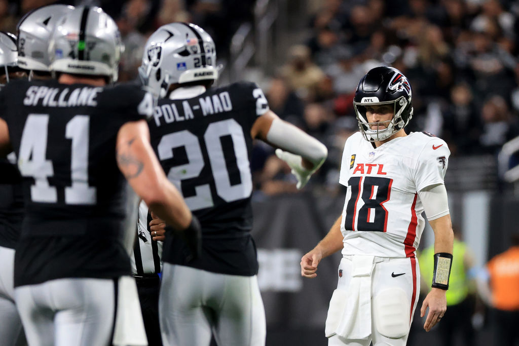 LAS VEGAS, NEVADA - DECEMBER 16: Kirk Cousins #18 of the Atlanta Falcons looks on against the Las V...