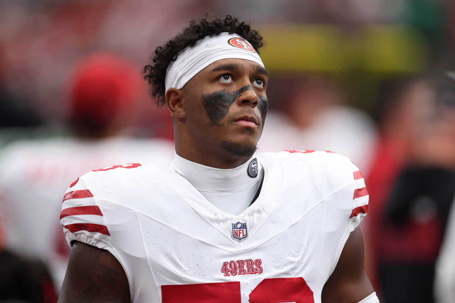 HOUSTON, TEXAS - OCTOBER 26: Dee Winters #53 of the San Francisco 49ers stands on the sideline in t...