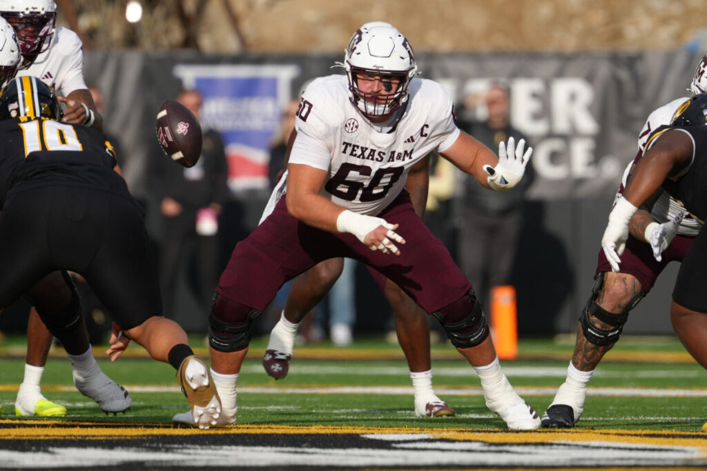 COLUMBIA, MISSOURI - NOVEMBER 08: Lineman Trey Zuhn III #60 of the Texas A&M Aggies blocksagainst the Missouri Tigers in the first half at Faurot Field at Memorial Stadium on November 08, 2025 in Columbia, Missouri. (Photo by Ed Zurga/Getty Images)
