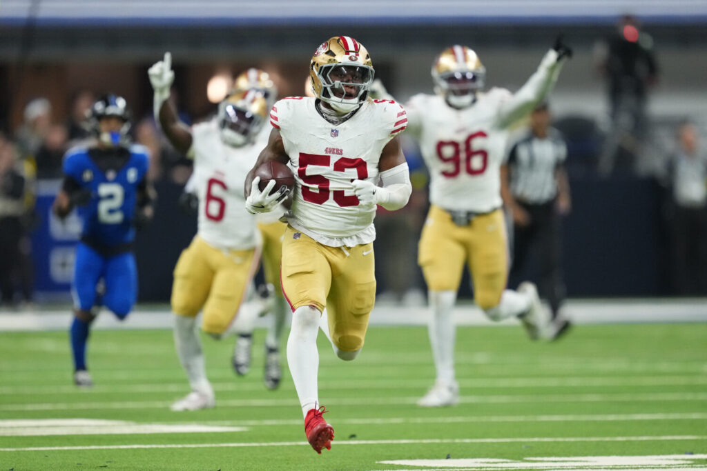 INDIANAPOLIS, INDIANA - DECEMBER 22: Dee Winters #53 of the San Francisco 49ers intercepts the pass for a touchdown during the fourth quarter of the game against the Indianapolis Colts at Lucas Oil Stadium on December 22, 2025 in Indianapolis, Indiana. (Photo by Dylan Buell/Getty Images)