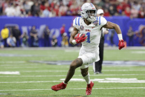 NEW ORLEANS, LOUISIANA - JANUARY 1: De'Zhaun Stribling #1 of the Ole Miss Rebels runs after a catch against the Georgia Bulldogs during the fourth quarter of the College Football Playoff Quarter Final Game at Caesars Superdome on January 1, 2026 in New Orleans, Louisiana. (Photo by CFP/Getty Images)