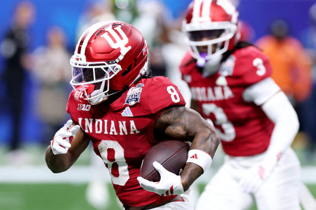 ATLANTA, GEORGIA - JANUARY 09: Kaelon Black #8 of the Indiana Hoosiers rushes for a touchdown against the Oregon Ducks during the fourth quarter in the 2025 College Football Playoff Semifinal at the Chick-fil-A Peach Bowl at Mercedes-Benz Stadium on January 09, 2026 in Atlanta, Georgia. (Photo by Kevin C. Cox/Getty Images)