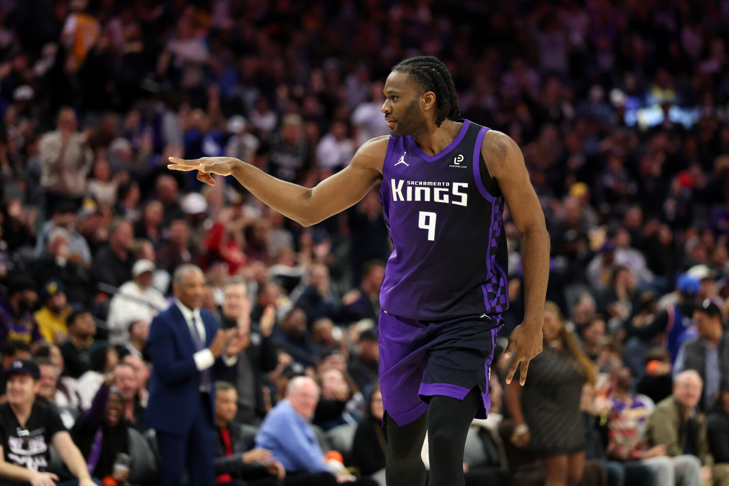 SACRAMENTO, CALIFORNIA - JANUARY 12: Precious Achiuwa #9 of the Sacramento Kings reacts after he ma...
