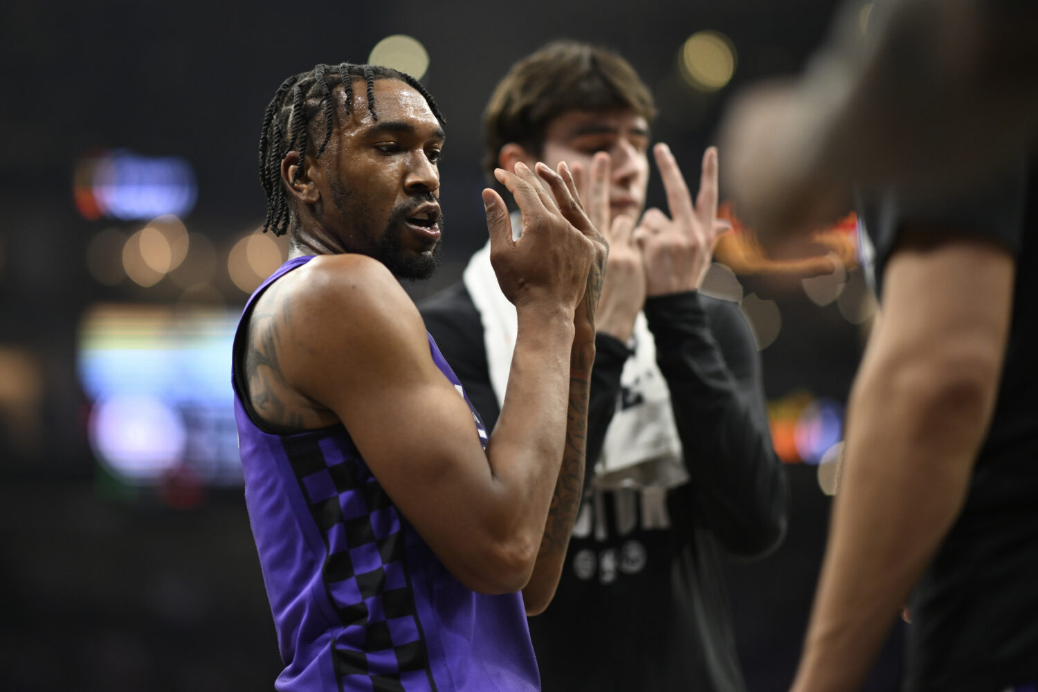 SACRAMENTO, CALIFORNIA - FEBRUARY 06: Malik Monk #0 of the Sacramento Kings celebrates with teammat...