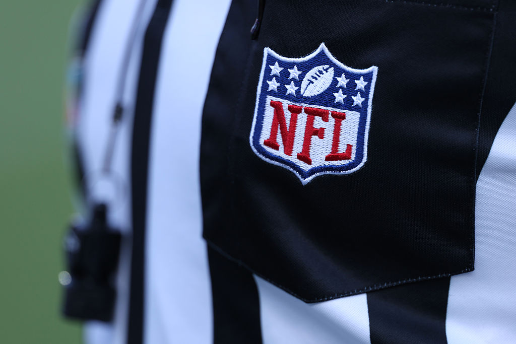 SANTA CLARA, CALIFORNIA - FEBRUARY 08: The NFL logo adorns the uniform of a referee prior to the st...