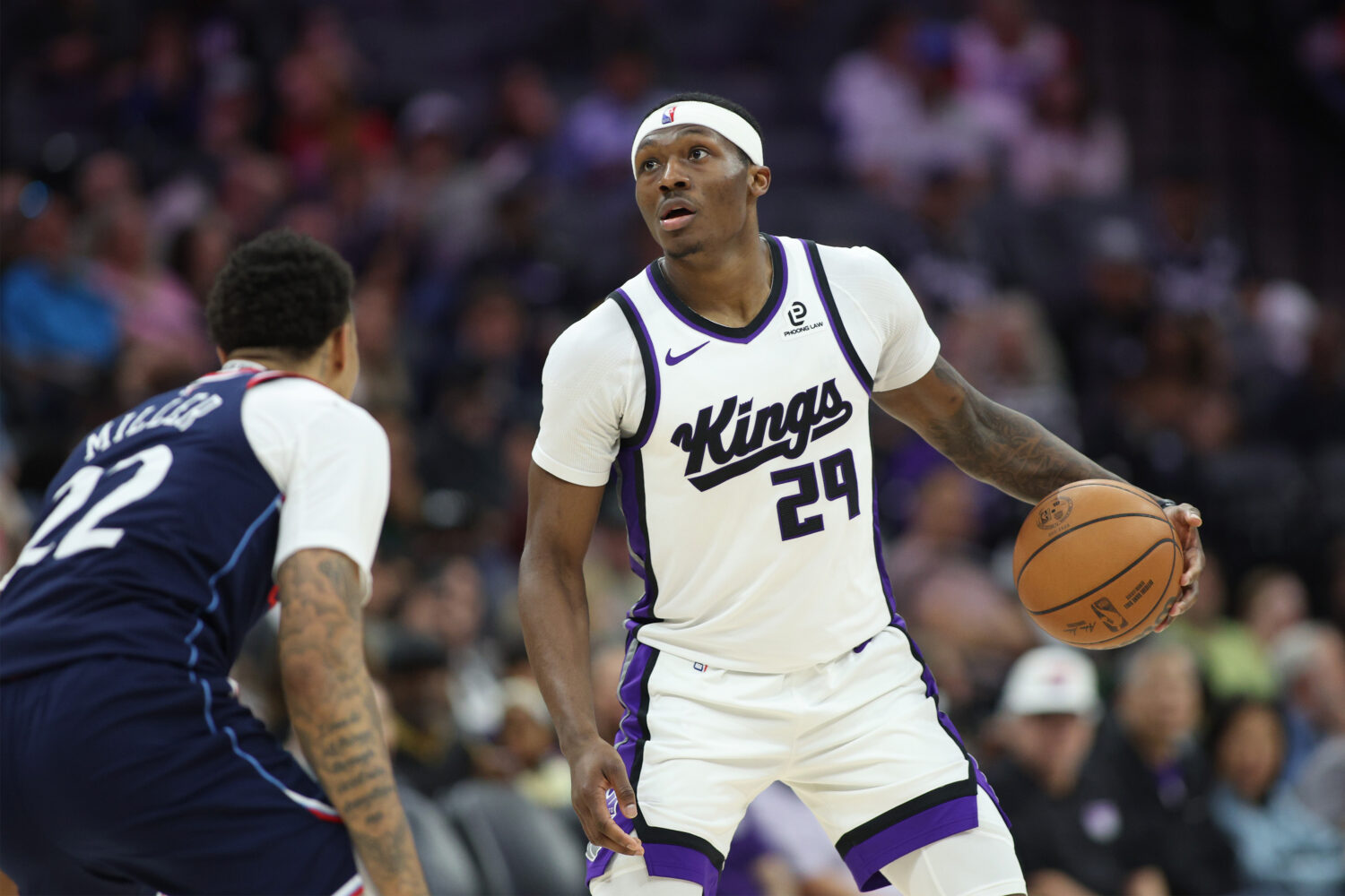 SACRAMENTO, CALIFORNIA - APRIL 05: Daeqwon Plowden #29 of the Sacramento Kings handles the ball dur...