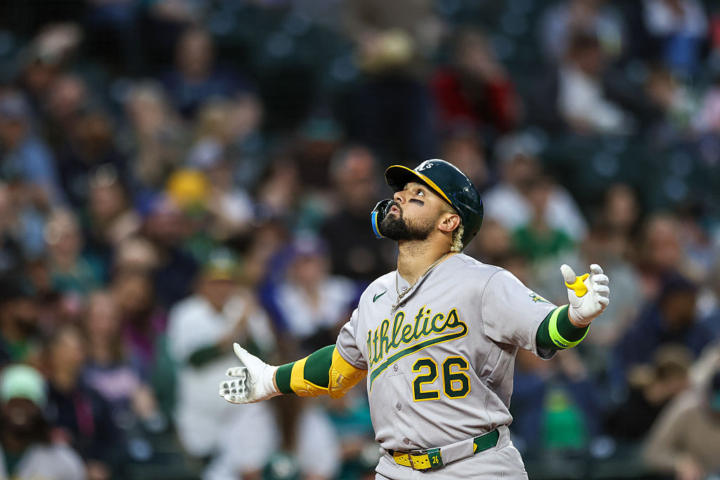 SEATTLE, WASHINGTON - APRIL 20: Carlos Cortes #26 of the Athletics gestures as he rounds the bases ...