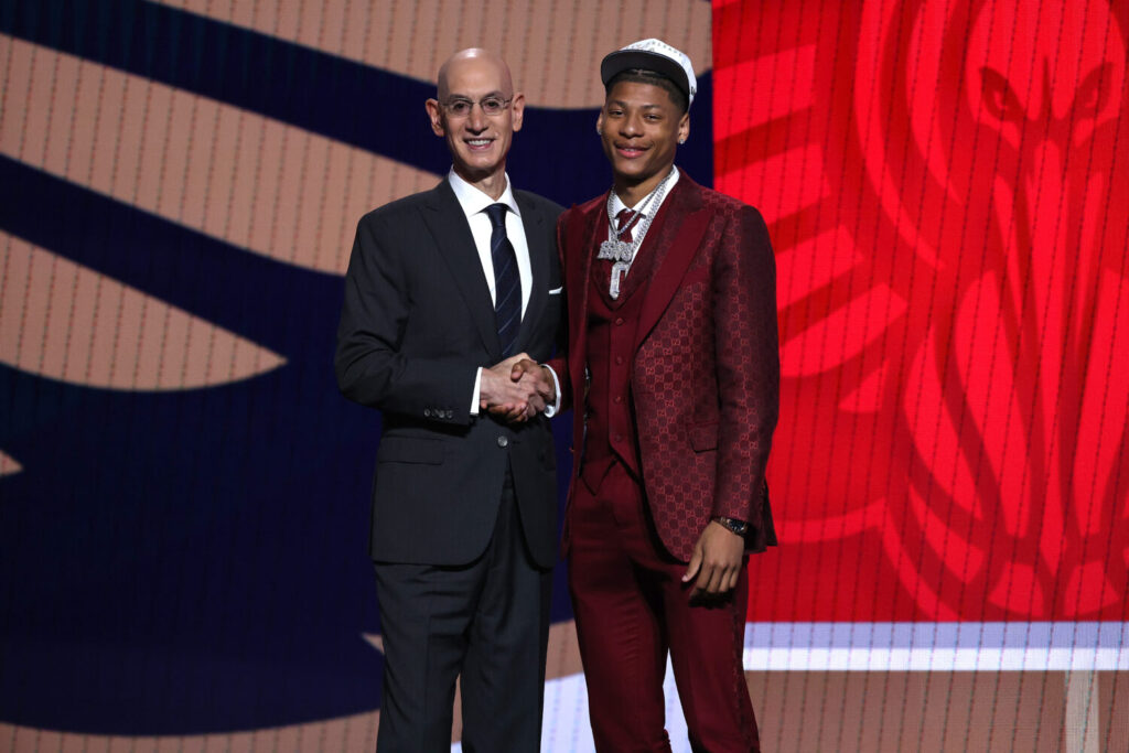 NEW YORK, NEW YORK - JUNE 25: Jeremiah Fears (R) shakes hands with NBA commissioner Adam Silver (L) after being drafted seventh overall by the New Orleans Pelicans during the first round of the 2025 NBA Draft at Barclays Center on June 25, 2025 in the Brooklyn borough of New York City. NOTE TO USER: User expressly acknowledges and agrees that, by downloading and/or using this photograph, user is consenting to the terms and conditions of the Getty Images License Agreement. (Photo by Sarah Stier/Getty Images)