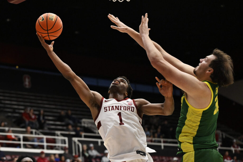 PALO ALTO, CALIFORNIA - OCTOBER 30: Ebuka Okorie #1 of the Stanford Cardinal goes up for a layup against Nate Bittle #32 of the Oregon Ducks in the second half of an exhibition game at Stanford Maples Pavilion on October 30, 2025 in Palo Alto, California. (Photo by Eakin Howard/Getty Images)