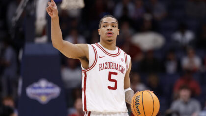NASHVILLE, TENNESSEE - MARCH 14: Darius Acuff Jr. #5 of the Arkansas Razorbacks looks on during the first half against the Ole Miss Rebels in the semifinal game of the 2026 SEC Men's Basketball Tournament at Bridgestone Arena on March 14, 2026 in Nashville, Tennessee. (Photo by Johnnie Izquierdo/Getty Images)