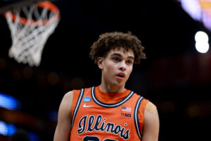 HOUSTON, TEXAS - MARCH 26: Keaton Wagler #23 of the Illinois Fighting Illini reacts against the Houston Cougars during the first half in the Sweet Sixteen of the 2026 NCAA Men's Basketball Tournament at Toyota Center on March 26, 2026 in Houston, Texas. (Photo by Kenneth Richmond/Getty Images)