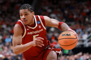 SAN JOSE, CALIFORNIA - MARCH 26: Darius Acuff Jr. #5 of the Arkansas Razorbacks dribbles the ball against the Arizona Wildcats during the first half in the Sweet Sixteen of the 2026 NCAA Men's Basketball Tournament at SAP Center on March 26, 2026 in San Jose, California. (Photo by Ezra Shaw/Getty Images) Sacramento Kings