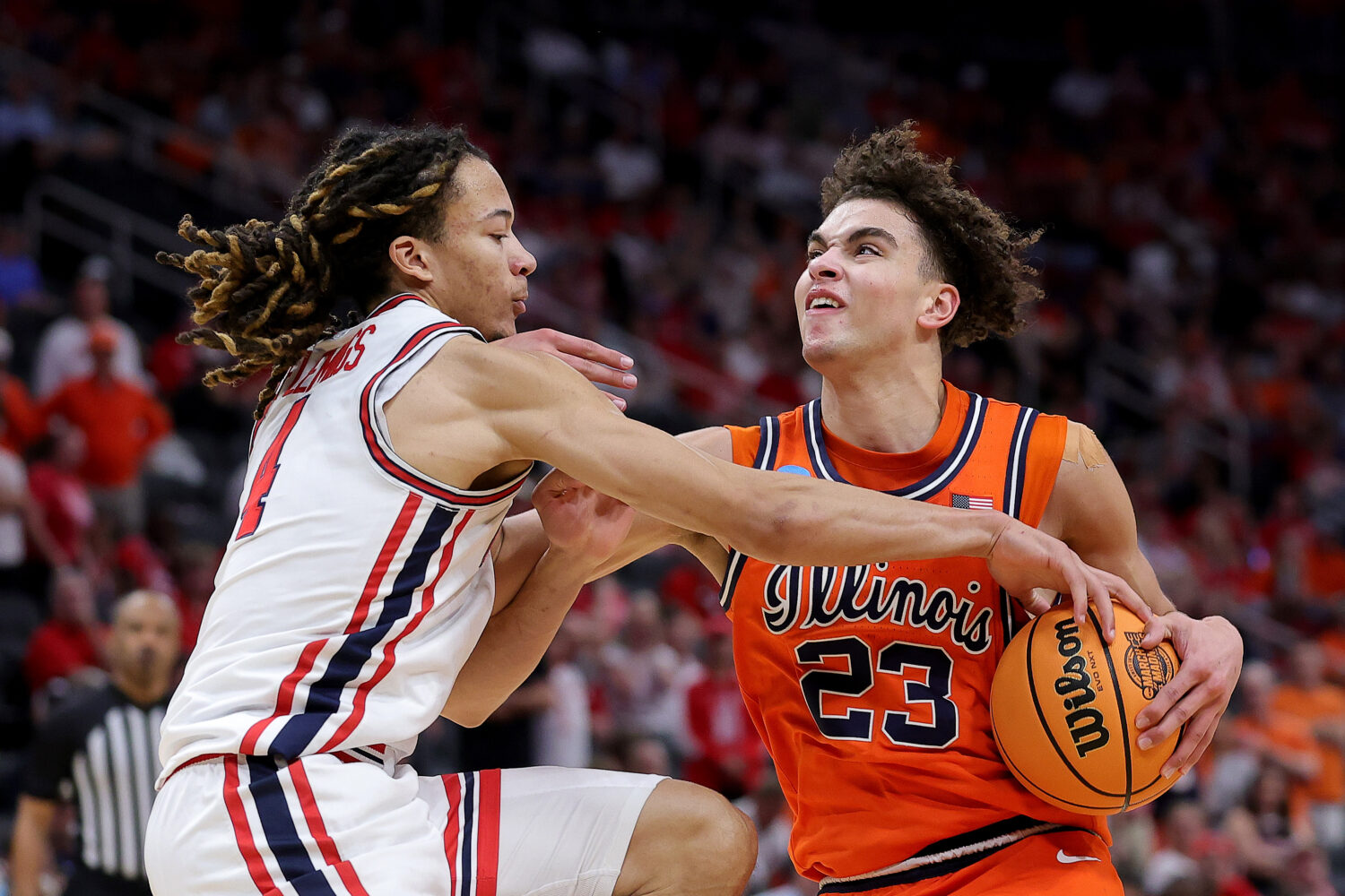 HOUSTON, TEXAS - MARCH 26: Keaton Wagler #23 of the Illinois Fighting Illini drives to the basket a...
