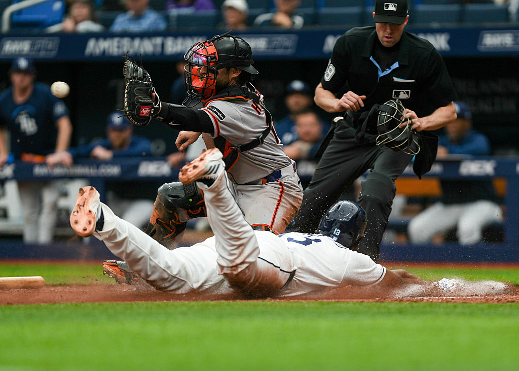 ST PETERSBURG, FLORIDA - MAY 03: Third baseman Junior Caminero #13 of the Tampa Bay Rays scores on ...