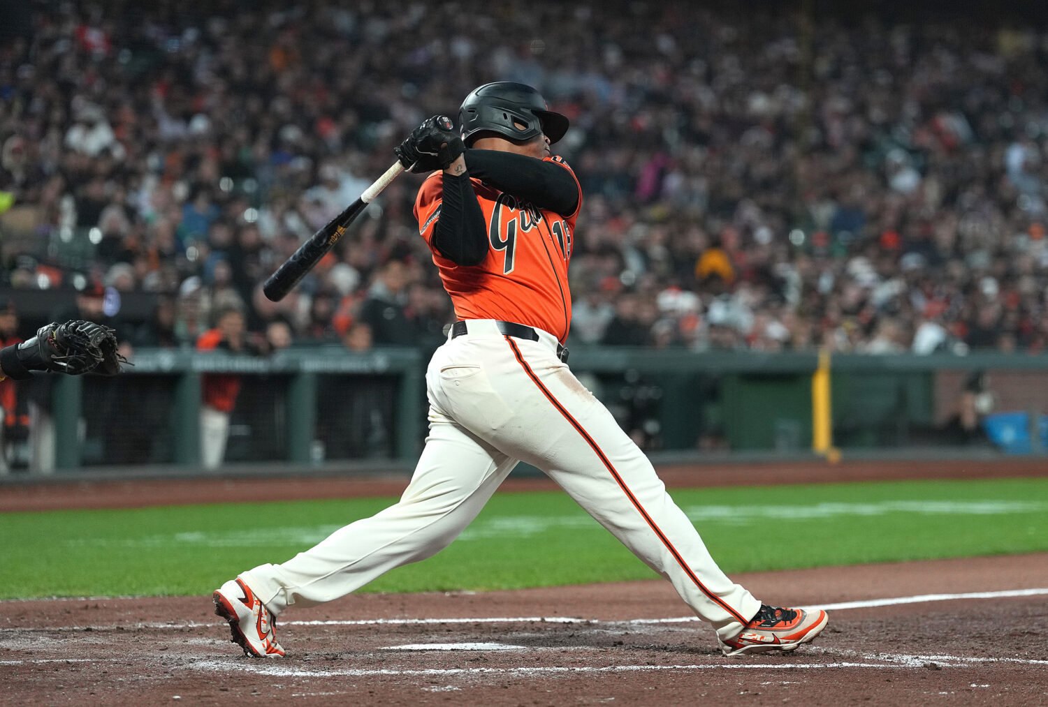 SAN FRANCISCO, CALIFORNIA - MAY 08: Rafael Devers #16 of the San Francisco Giants hits a single aga...