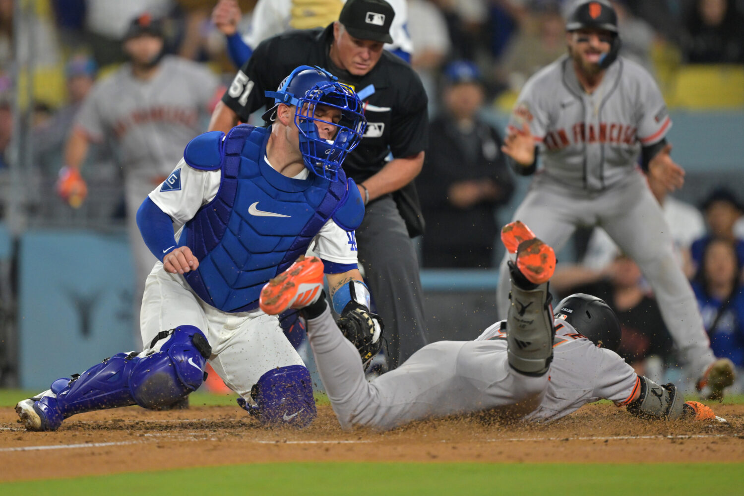 LOS ANGELES, CALIFORNIA - MAY 14: Jung Hoo Lee #51 of the San Francisco Giants beats the throw to D...