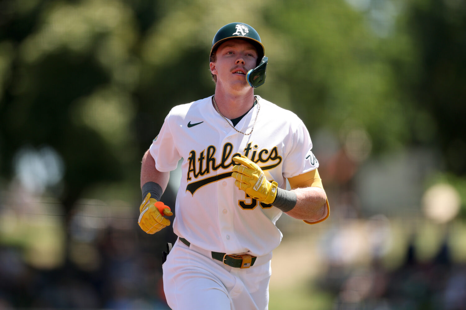 SACRAMENTO, CALIFORNIA - MAY 14: Henry Bolte #3 of the Athletics jogs back to the dugout after flyi...