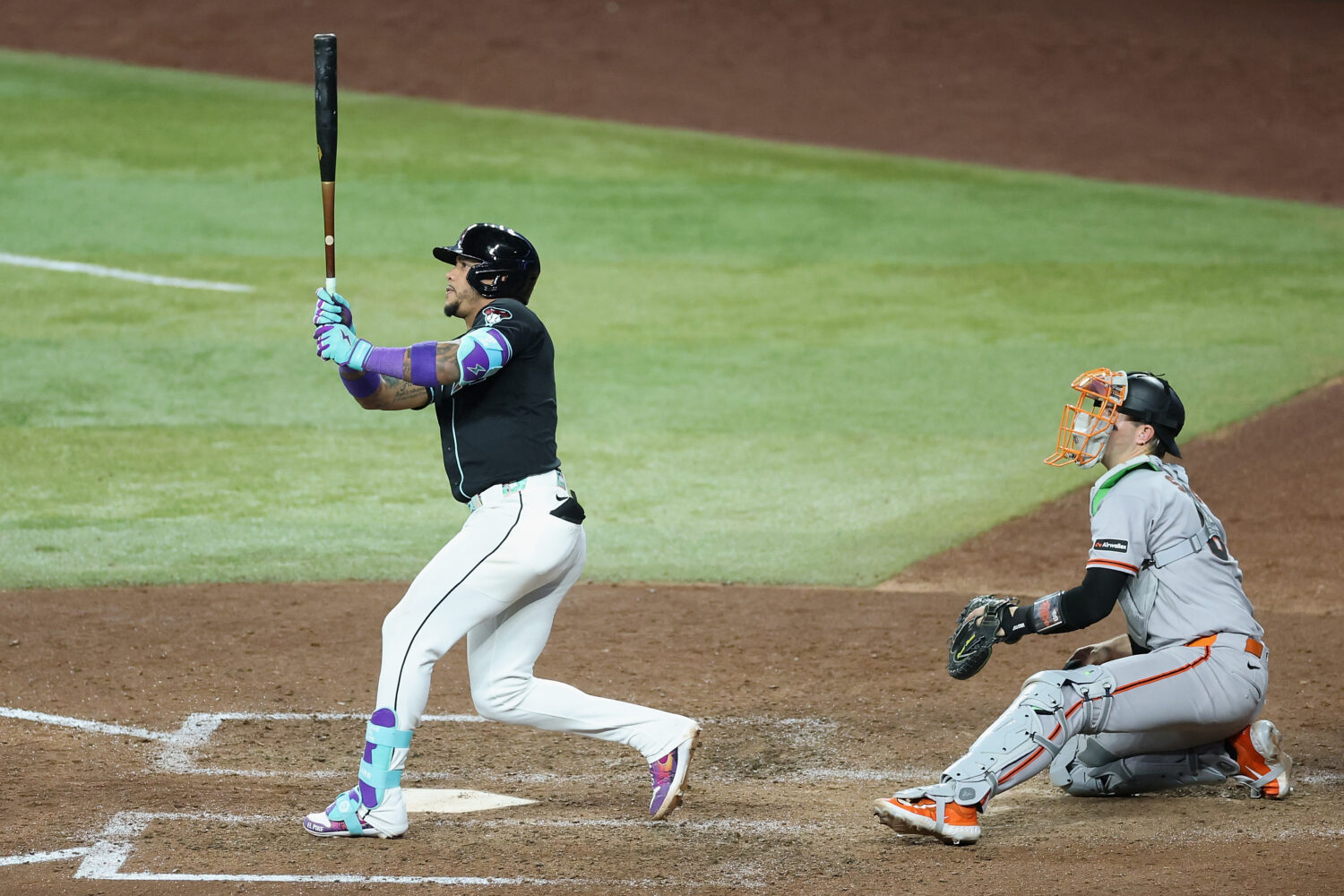 PHOENIX, ARIZONA - MAY 19: Ketel Marte #4 of the Arizona Diamondbacks hits a walk off three-run hom...