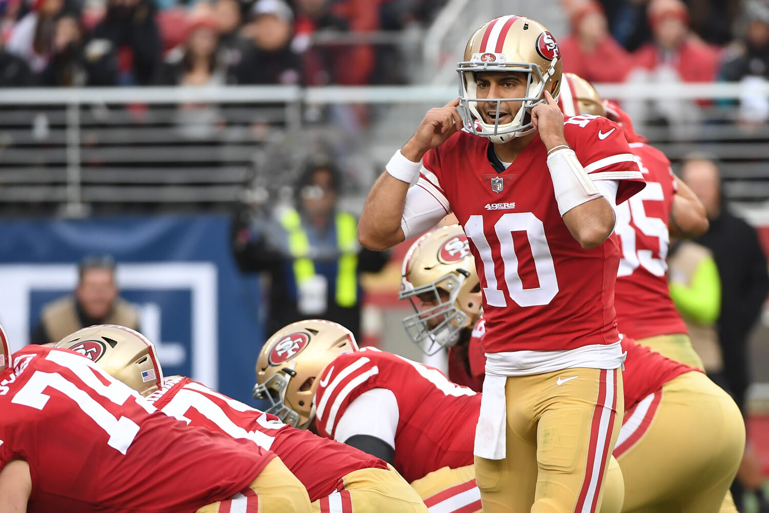 SANTA CLARA, CA - DECEMBER 24: Jimmy Garoppolo #10 of the San Francisco 49ers signalsto his team du...