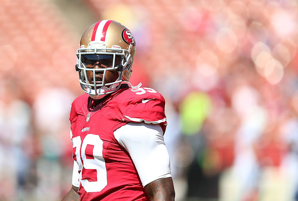SAN FRANCISCO, CA - SEPTEMBER 22: Aldon Smith #99 of the San Francisco 49ers looks on during warm-u...