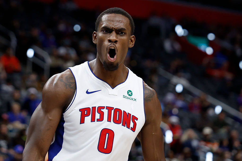 DETROIT, MICHIGAN - NOVEMBER 17: Jalen Duren #0 of the Detroit Pistons reacts after he dunks in the...