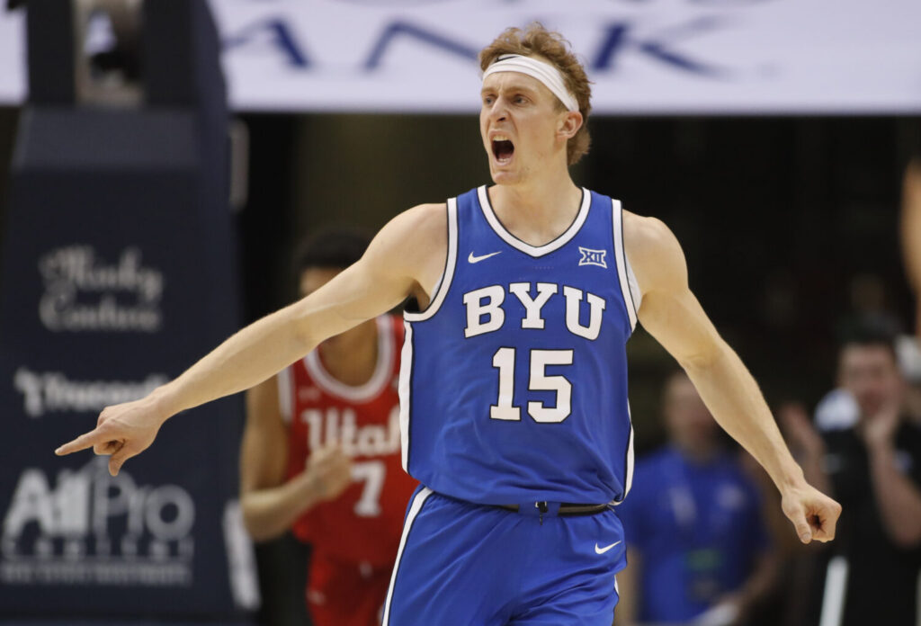 PROVO, UT - JANUARY 24:  Richie Saunders #15 of the Brigham Young Cougars calls a defense against the Utah Utes during the first half of their game at the Marriott Center on January 24, 2026 in Provo, Utah.(Photo by Chris Gardner/Getty Images)