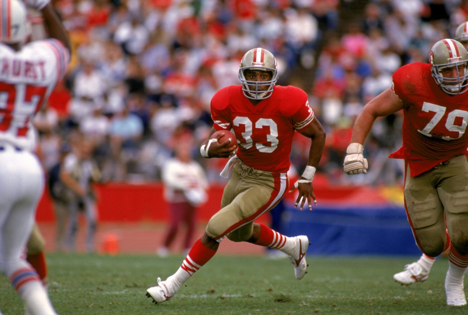 SAN FRANCISCO - OCTOBER 22: Running back Roger Craig #33 of the San Francisco 49ers looks for room ...